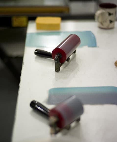 Trained tailors stitching garments as part of LAMBLILY's stitching cutting and sampling process